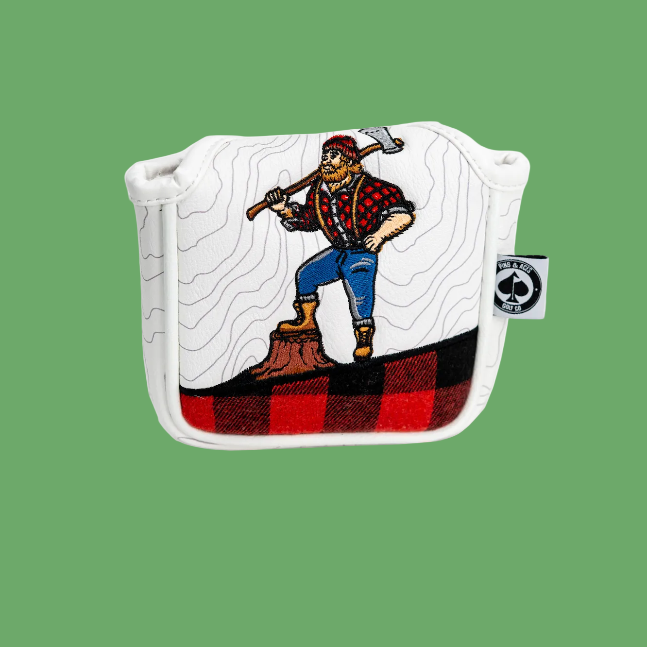 Embroidered lumberjack figure holding axe on white putter mallet cover with red and black plaid pattern at base and topographic lines background