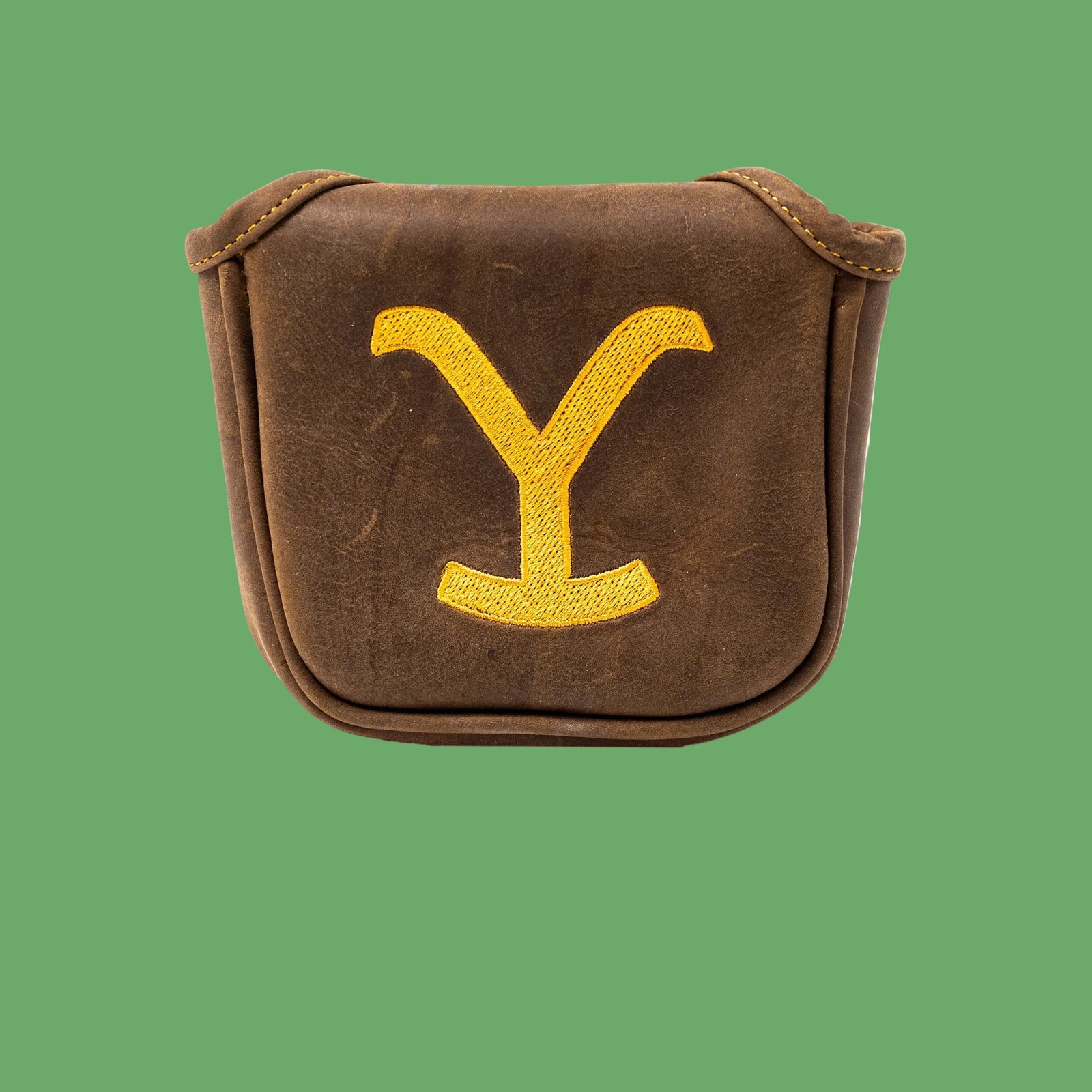 Brown synthetic leather mallet putter cover with yellow embroidered "Y" logo and tan stitching on front flap