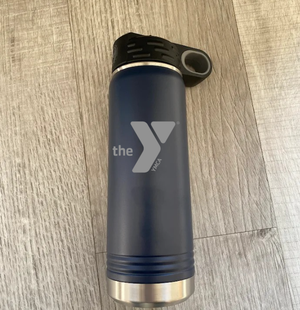 Dark blue insulated water bottle with black flip-top lid, stainless steel base band, and etched logo design on front