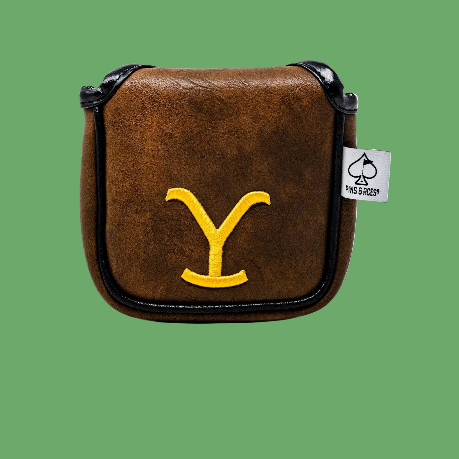 Brown Yellowstone-themed mallet putter cover with embroidered yellow “Y” logo