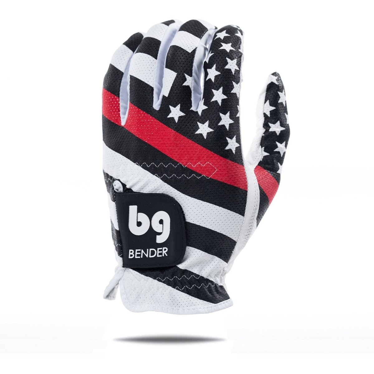 Black, white, and red mesh golf glove with thin red line flag design and white stars, featuring Cabretta leather palm and wrist strap with brand logo.