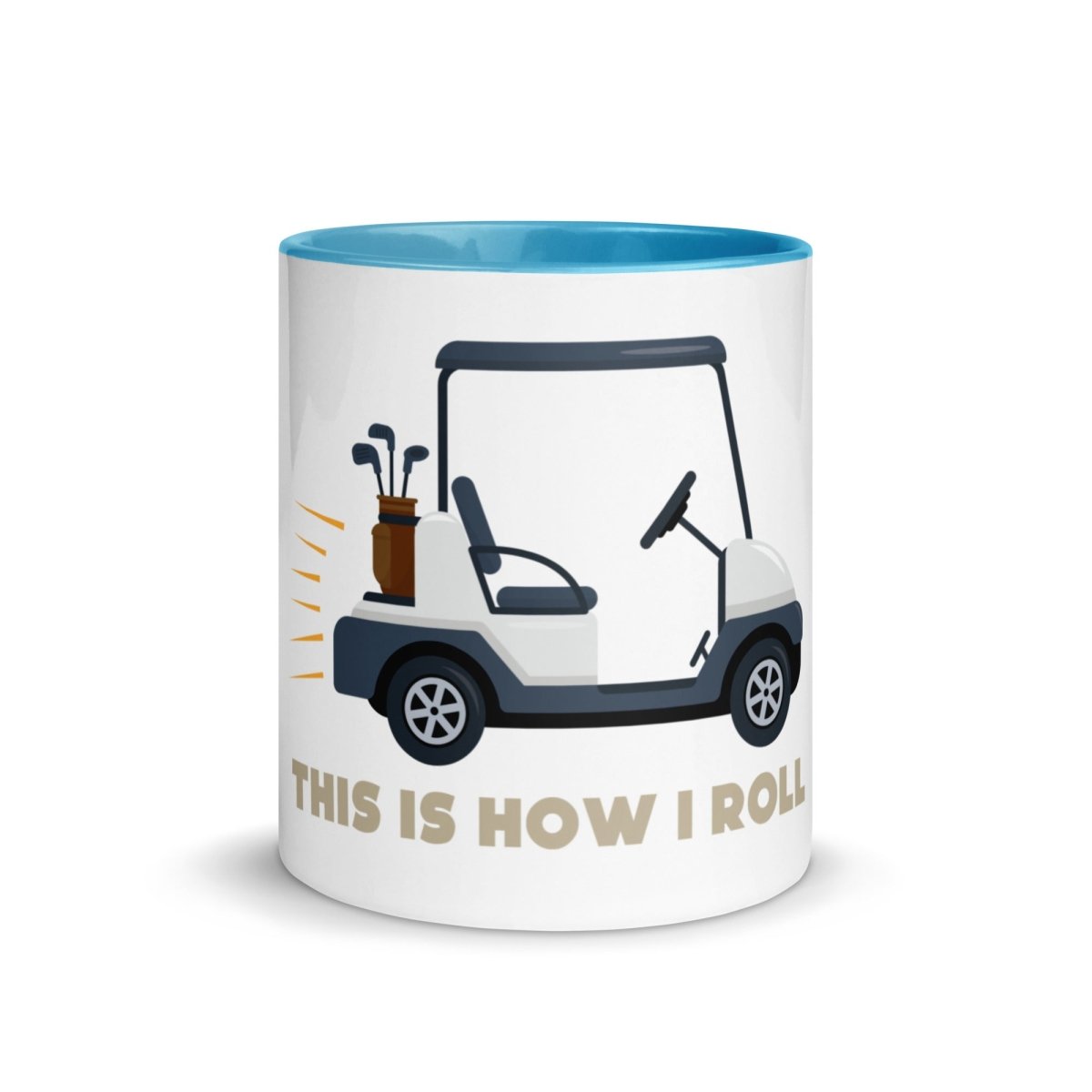 White ceramic mug with blue rim and handle, featuring illustrated golf cart with bag of clubs and text reading "This is How I Roll