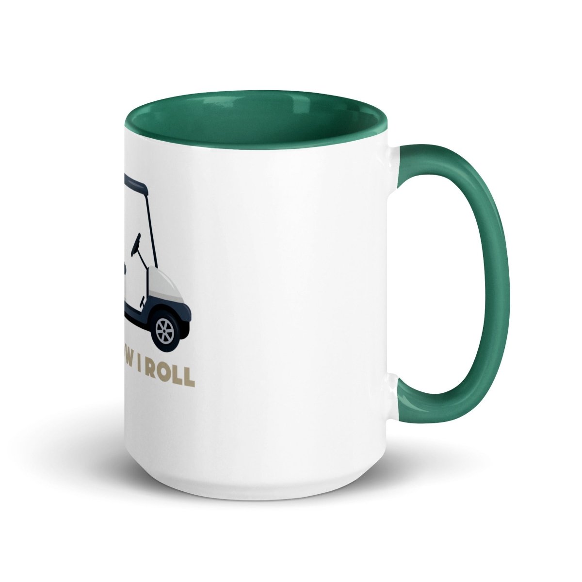 White ceramic mug with green interior, rim, and handle, printed with golf cart graphic and "THIS IS HOW I ROLL" text in gold lettering