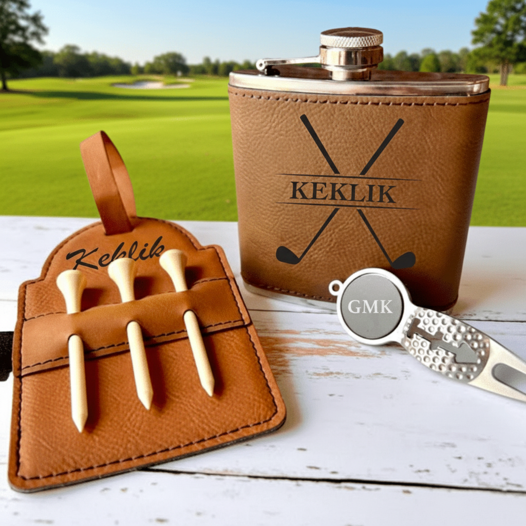 Golf gift set with flask, vegan leather tag, and divot tool in gift-ready packaging
