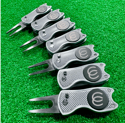 Custom logo golf divot tools personalized in bulk for tournament player gifts from Groovy Golfer
