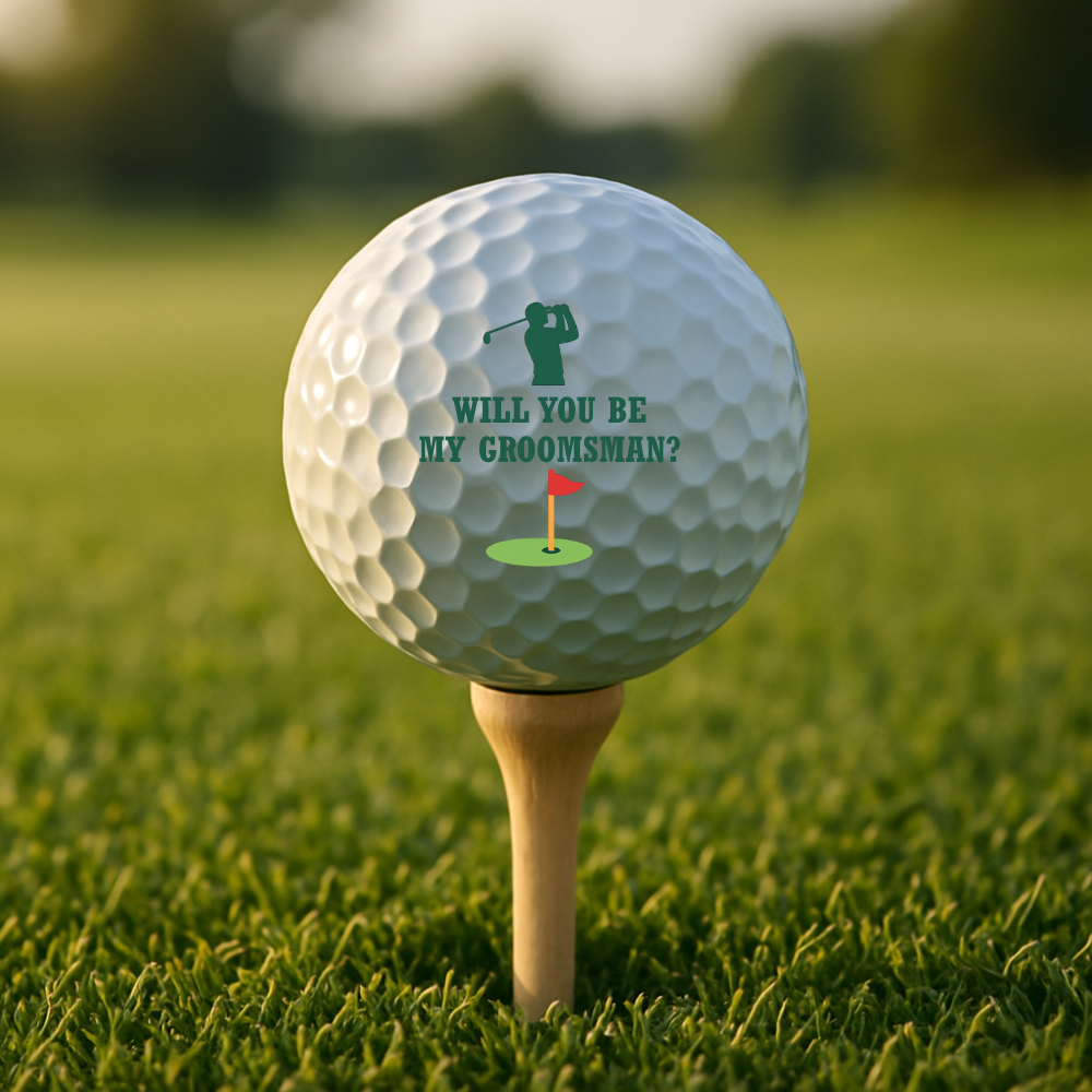 Golf ball with “Will You Be My Groomsman?” text and golfer design