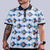 White Aztec polo with teal, orange & navy diamond pattern, 4‑way stretch, UPF 50+, moisture‑wicking, anti‑odor & wrinkle resistance.