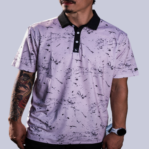 Men’s cream polo with subtle drip-splatter texture and contrast black collar—classic and breathable performance fit.
