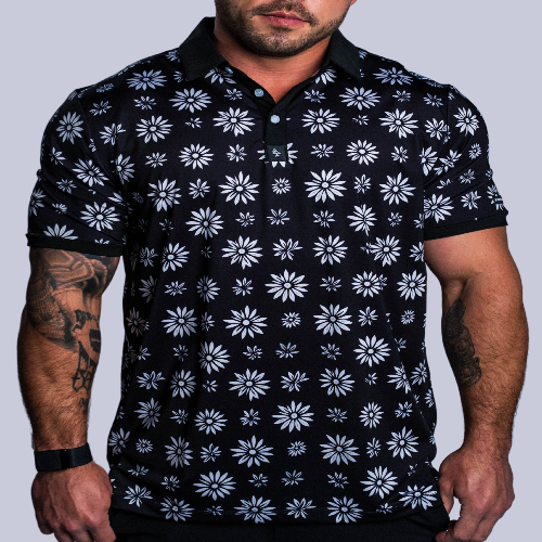 Men’s dark navy polo with white and grey daisy floral print – bold, breathable, stretch-performance ready.