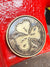 golf ball marker with "Lucky" design