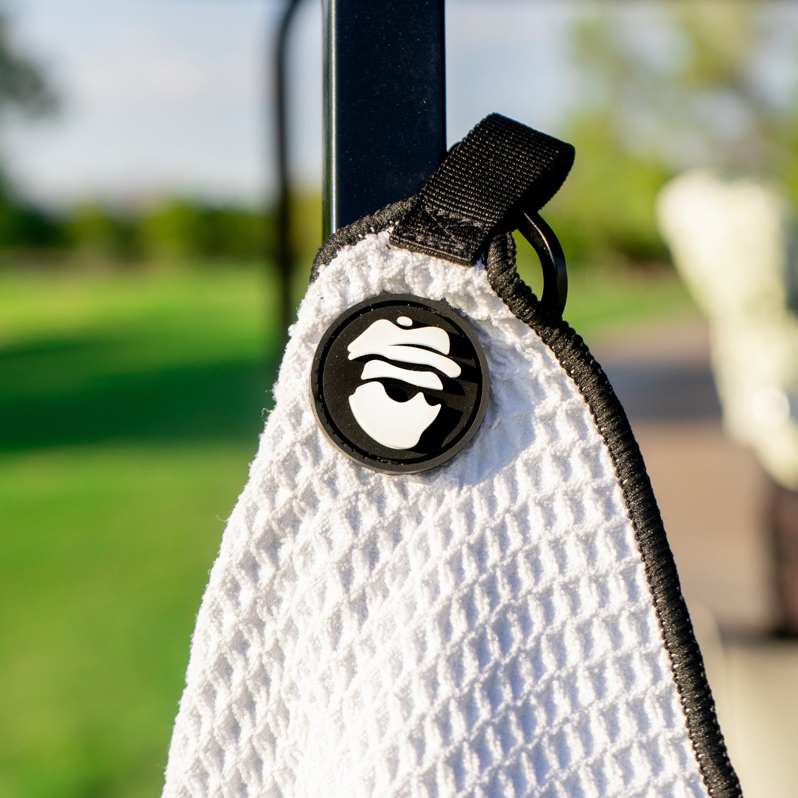magnetic golf towel with ball cleaning pocket