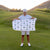 oversized white golf caddy towel with green logo pattern