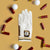 camo golf glove with brown leather palm and thumb detail