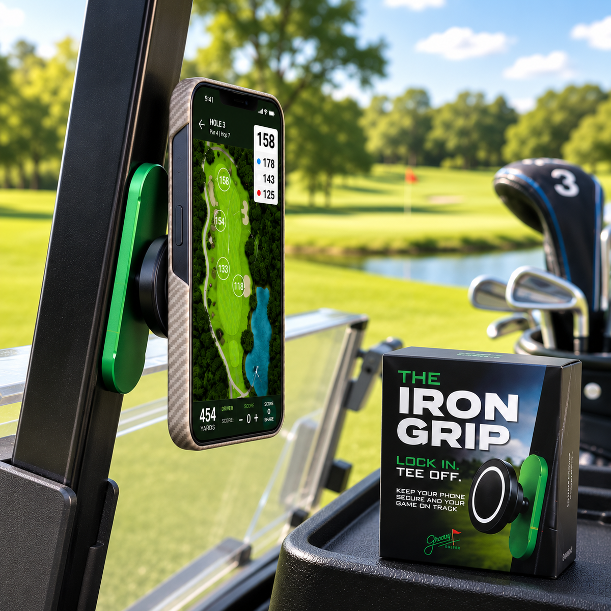 Smartphone mounted on golf cart displaying course layout and yardage data, with green Iron Grip phone holder attached and product box visible on cart rail overlooking fairway.