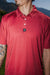 Men’s red polo with white polka dots – playful retro print with stretch, moisture-wicking, and wrinkle-resistant performance