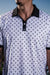 Men’s white polo with small navy palm leaf print and contrast collar – tropical-infused, stretch-performance ready.
