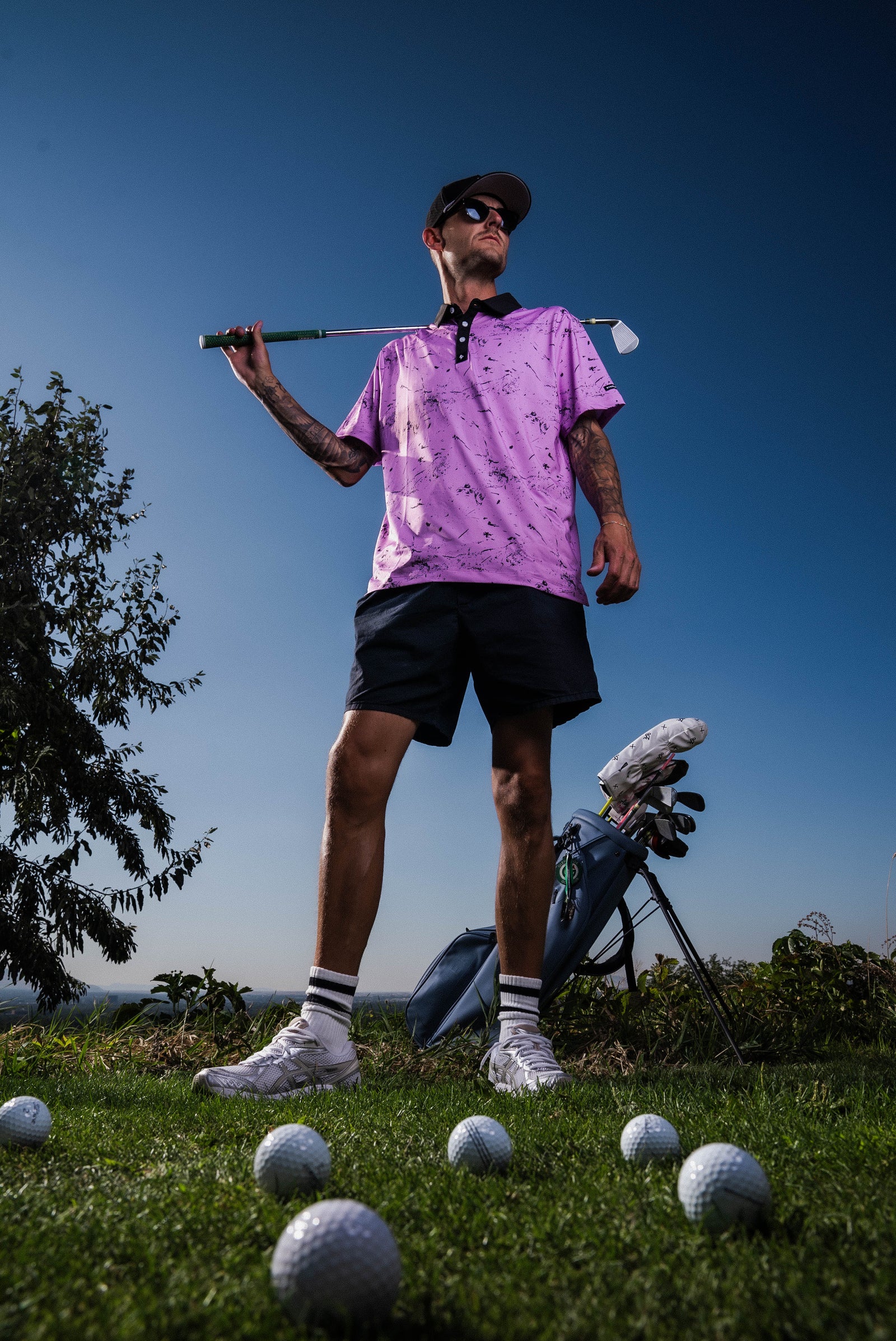 Men’s soft pink polo with light drip texture pattern – breathable, stretch-performance shirt with subtle visual depth.