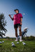 Men’s hot pink polo with black micro-spot pattern – bold, breathable, and stretch-fit performance.