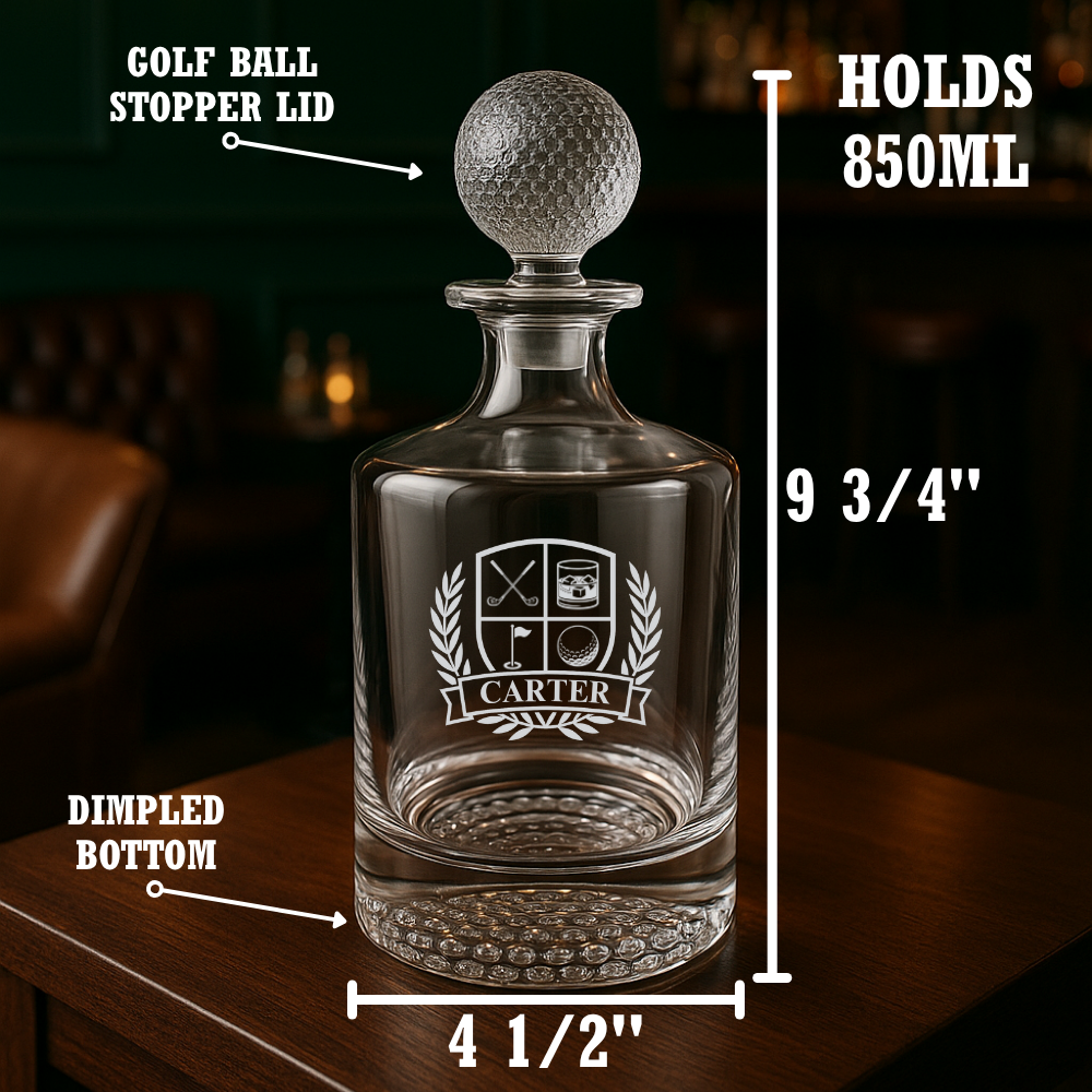 Personalized golf crest whiskey decanter with golf ball stopper and laurel design