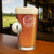 Custom golf ball pint glass with wedding crest and embedded real Titleist golf ball