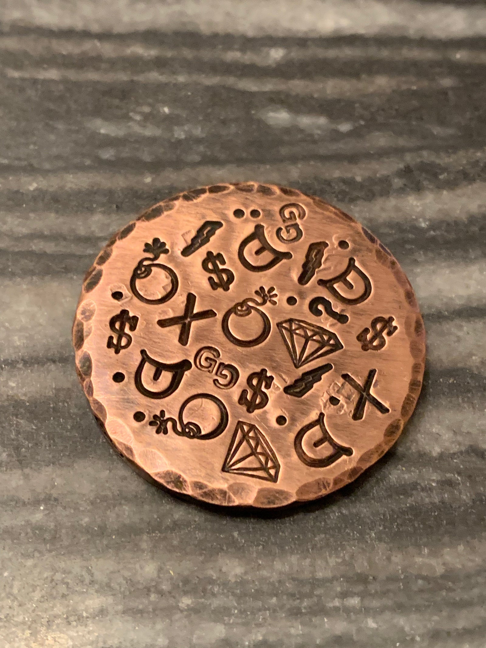 brass golf ball marker engraved “I WILL NOT 3 PUTT”