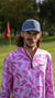 Adjustable golf hat with snap closure and breathable material.