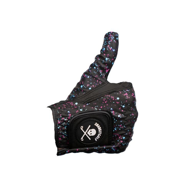 Black Cabretta leather golf glove with colorful paint splatter pattern and reinforced palm padding, displayed on a hand model