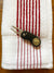 The Tiger Bundle red-striped golf towel, divot tool, magnetic ball marker