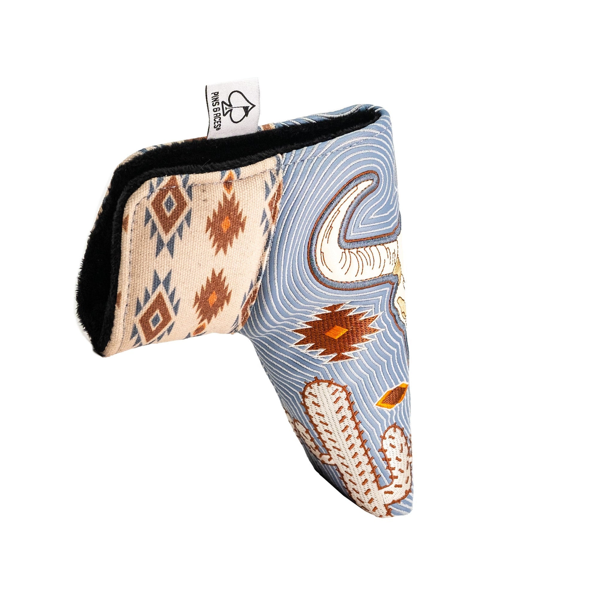 Southwestern-themed golf putter cover with bull skull and cactus design
