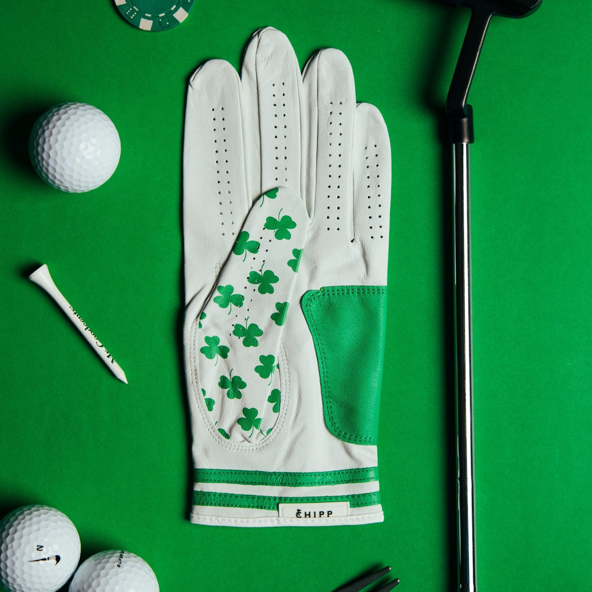 Golf glove with green clover pattern on premium cabretta leathe