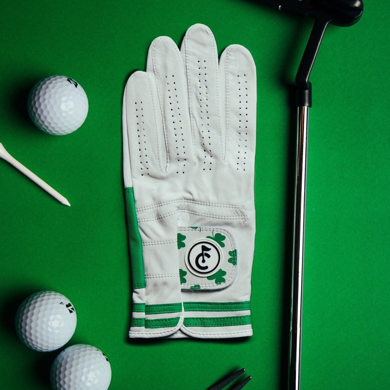 Golf glove with green clover pattern on premium cabretta leathe