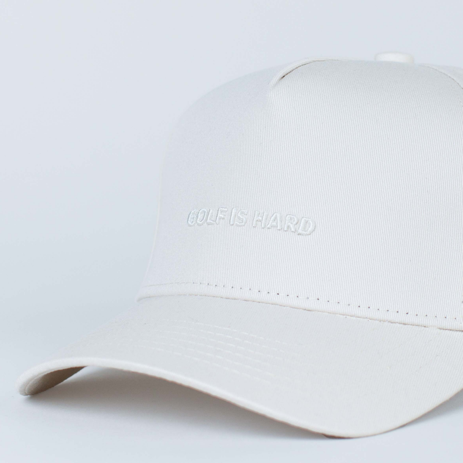 Golf Is Hard embroidered golf hat with snapback closure