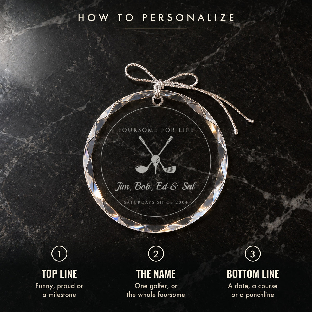 How to personalize the golf ornament: 1 top line, 2 the name, 3 bottom line, shown on black marble engraved FOURSOME FOR LIFE with four names