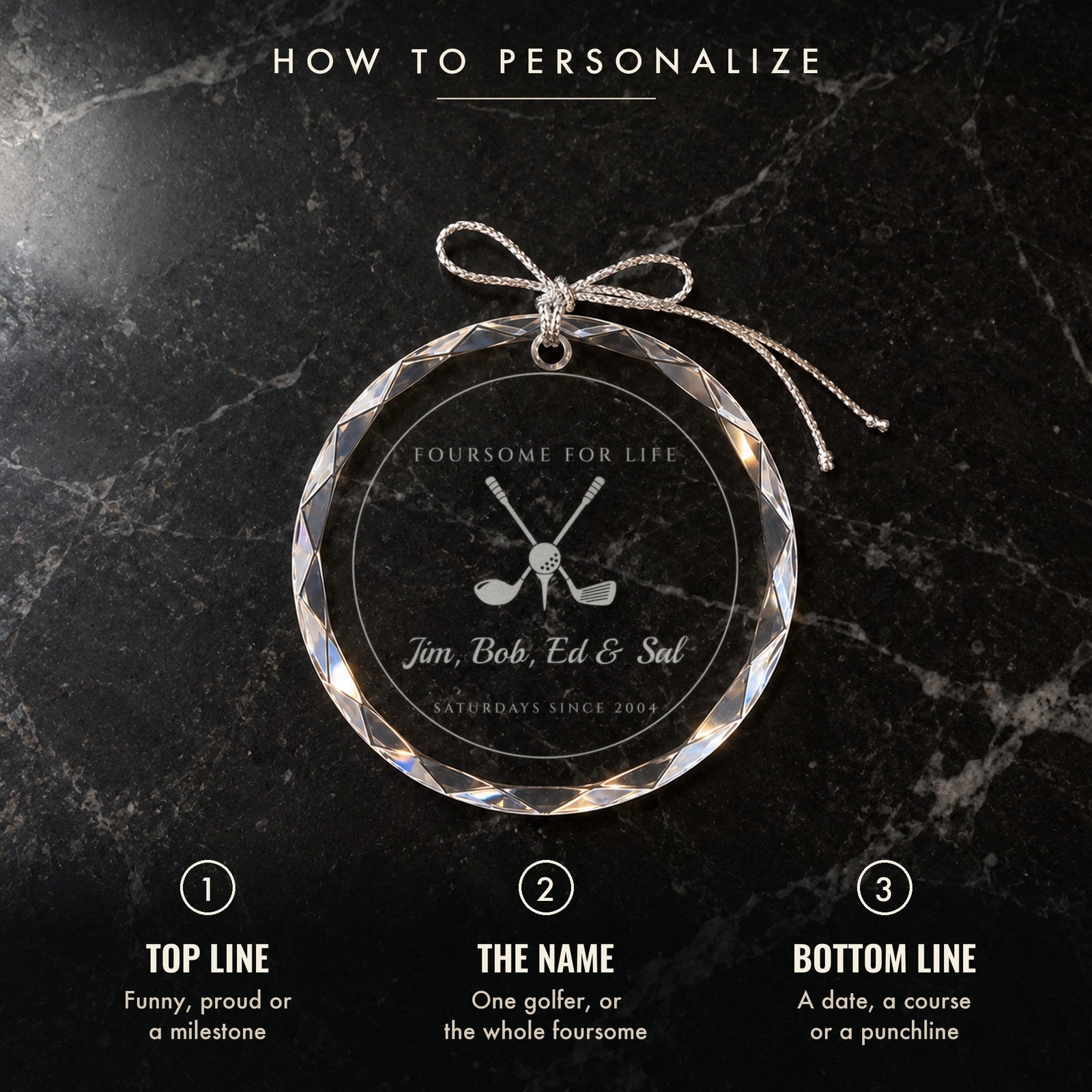 How to personalize the golf ornament: 1 top line, 2 the name, 3 bottom line, shown on black marble engraved FOURSOME FOR LIFE with four names