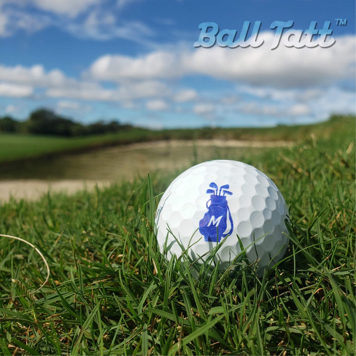 M Initial golf ball stamp with golf bag design for personalized marking.