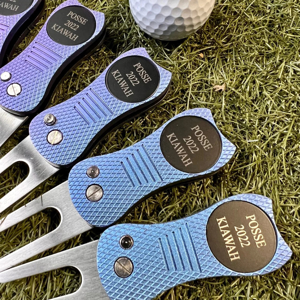 Custom logo divot tool with personalized magnetic ball marker.