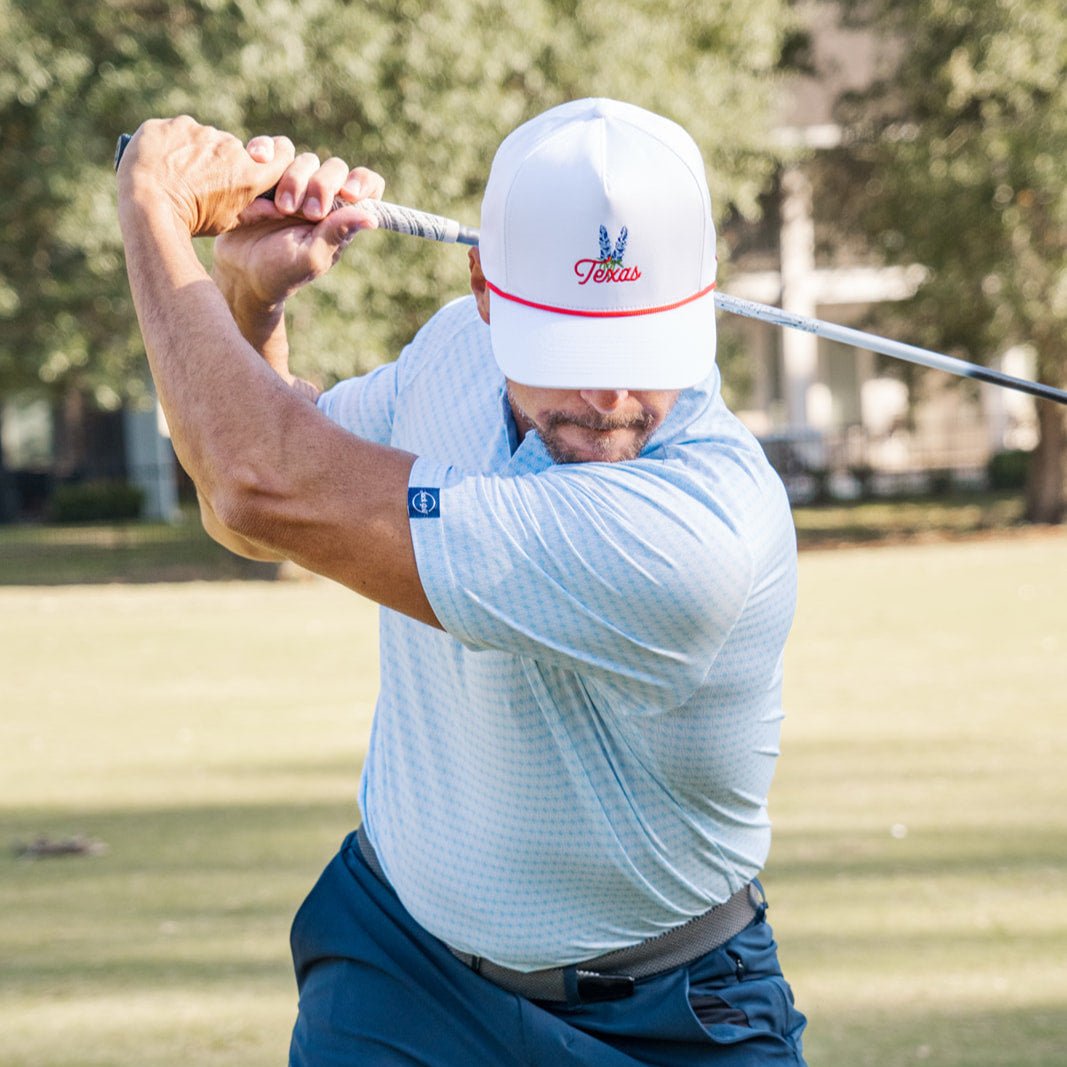 Golfer Swinging in Texas Red hat 