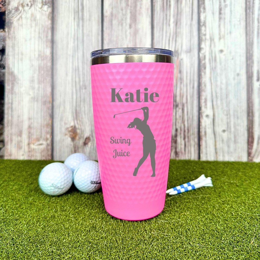 Personalized golf gift set with a bag tag and tumbler in pink tones